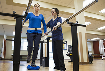 Patient undergoing physical therapy to improve balance