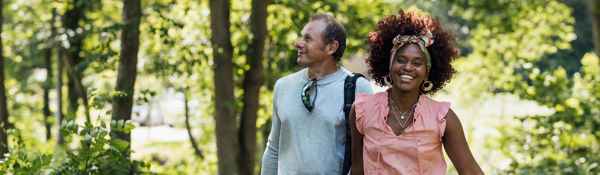 A couple walking in the woods