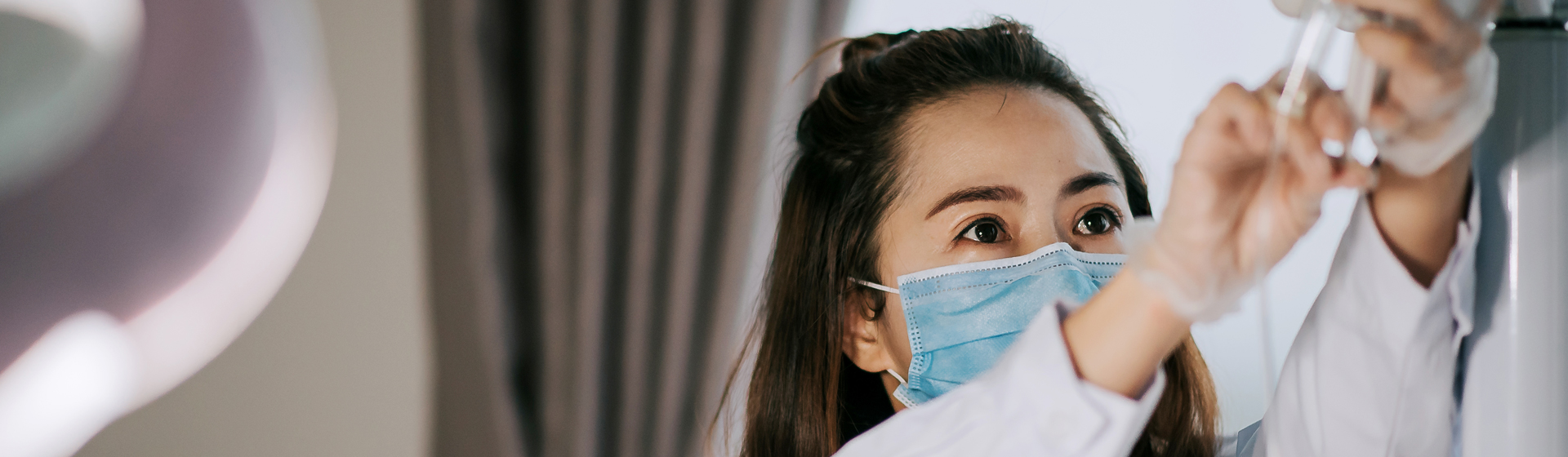 Anesthesiologist at patient's bedside