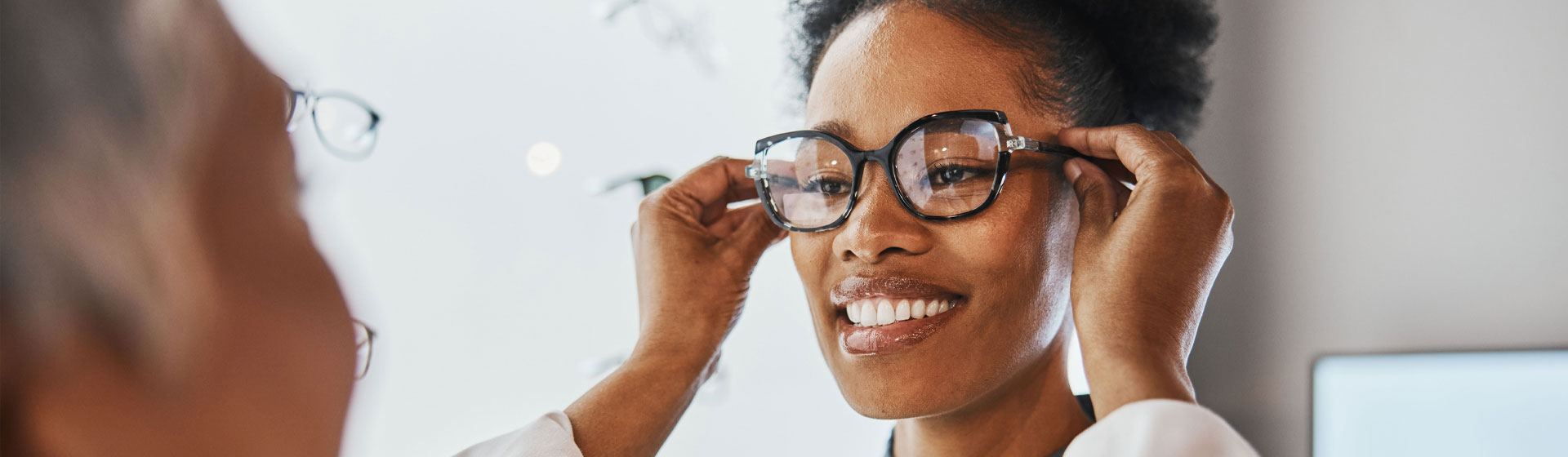 Woman getting her glasses checked