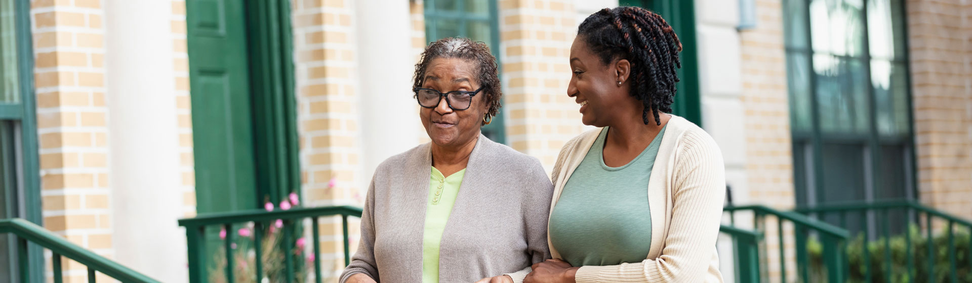 Mother and daughter walking together