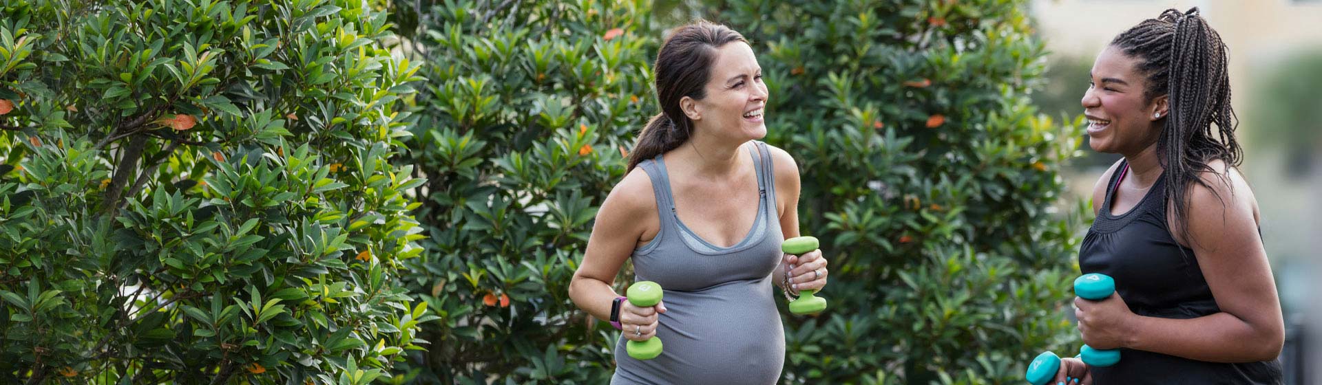 Two pregnant women working out