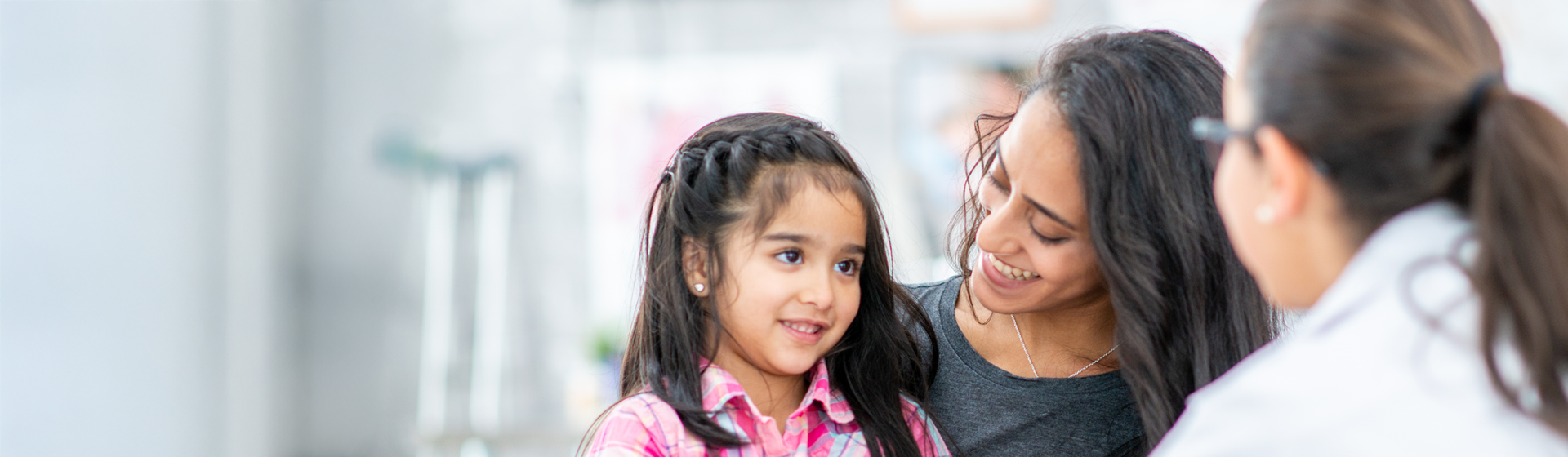Mother and daughter at the doctor's office