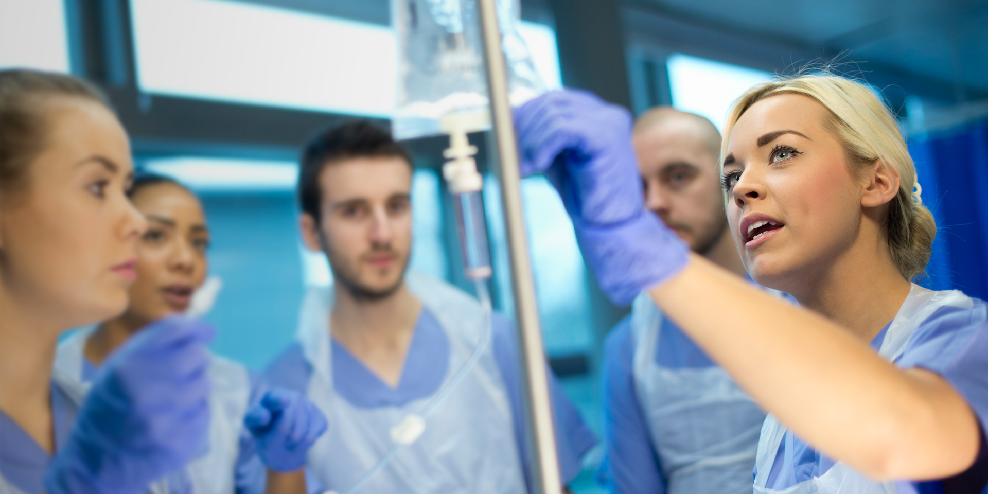 Medical training class reviews an IV bag