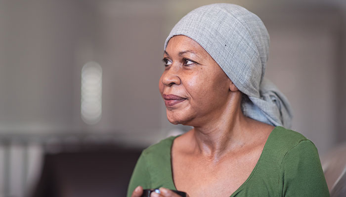 Cancer patient reflects while drinking tea 