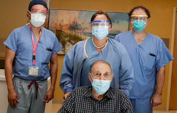 BIDMC patient Tom Marchese with the Structural Heart Center Surgery team.