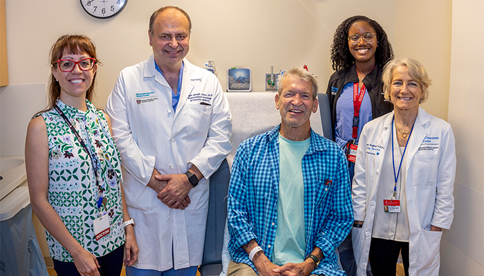 Peter Elliston with his medical team