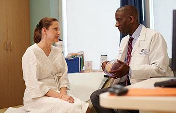 BIDMC's Dr. James speaks with a BreastCare Center patient