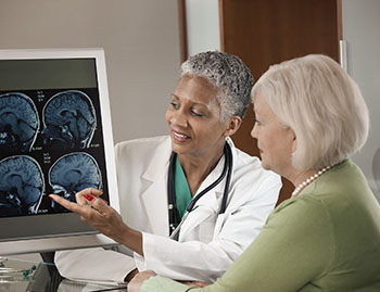Brain Aneurysm Imaging - Doctor with Patient