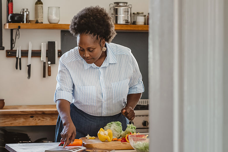 A woman cooking in the kitchen
