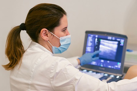 Provider looking at imaging